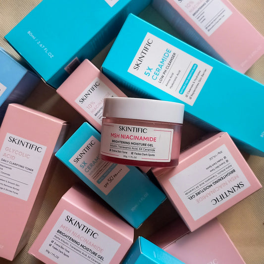 a pile of skin care products sitting on top of each other